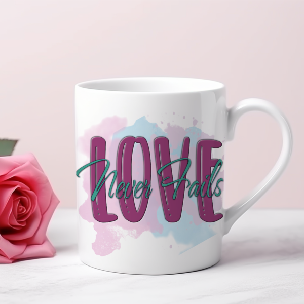 Love Never Fails 110z Mug