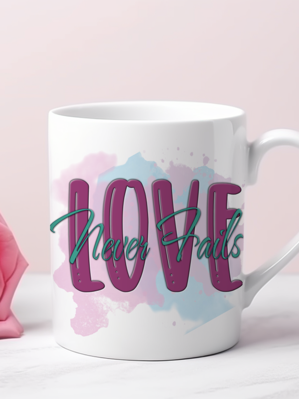 Love Never Fails 110z Mug